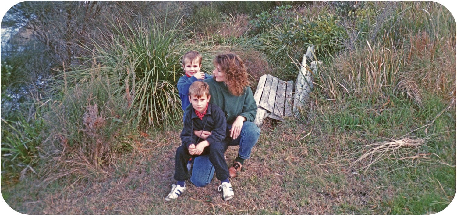 learning to breath in nature a mother and her two young sons enjoy a break in the bush on the south east coast of Australia